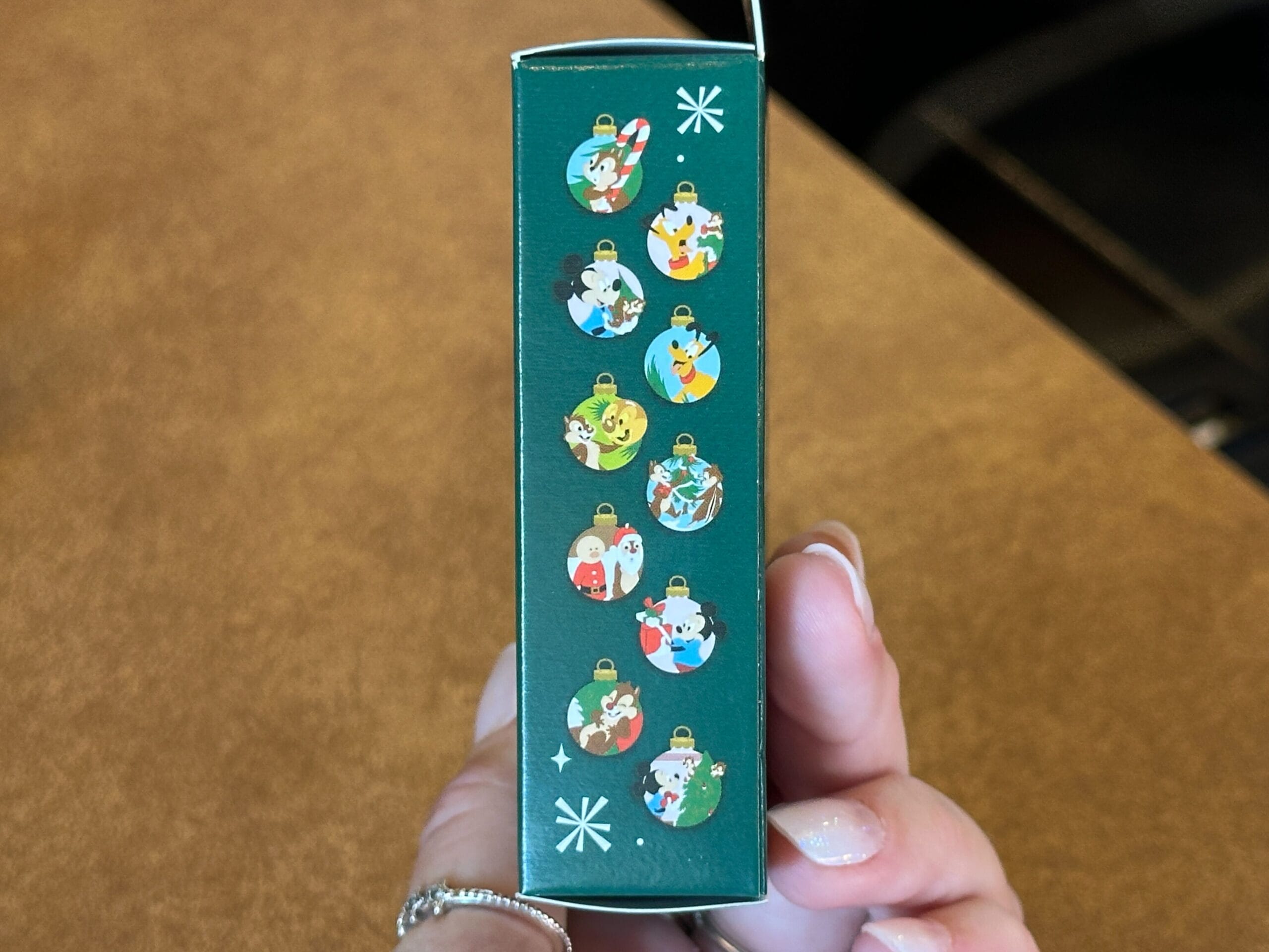 Disney World Pin Tuesday: New Pin Trading 25th Anniversary Pins, Pluto's Christmas Tree Mystery Set, and More