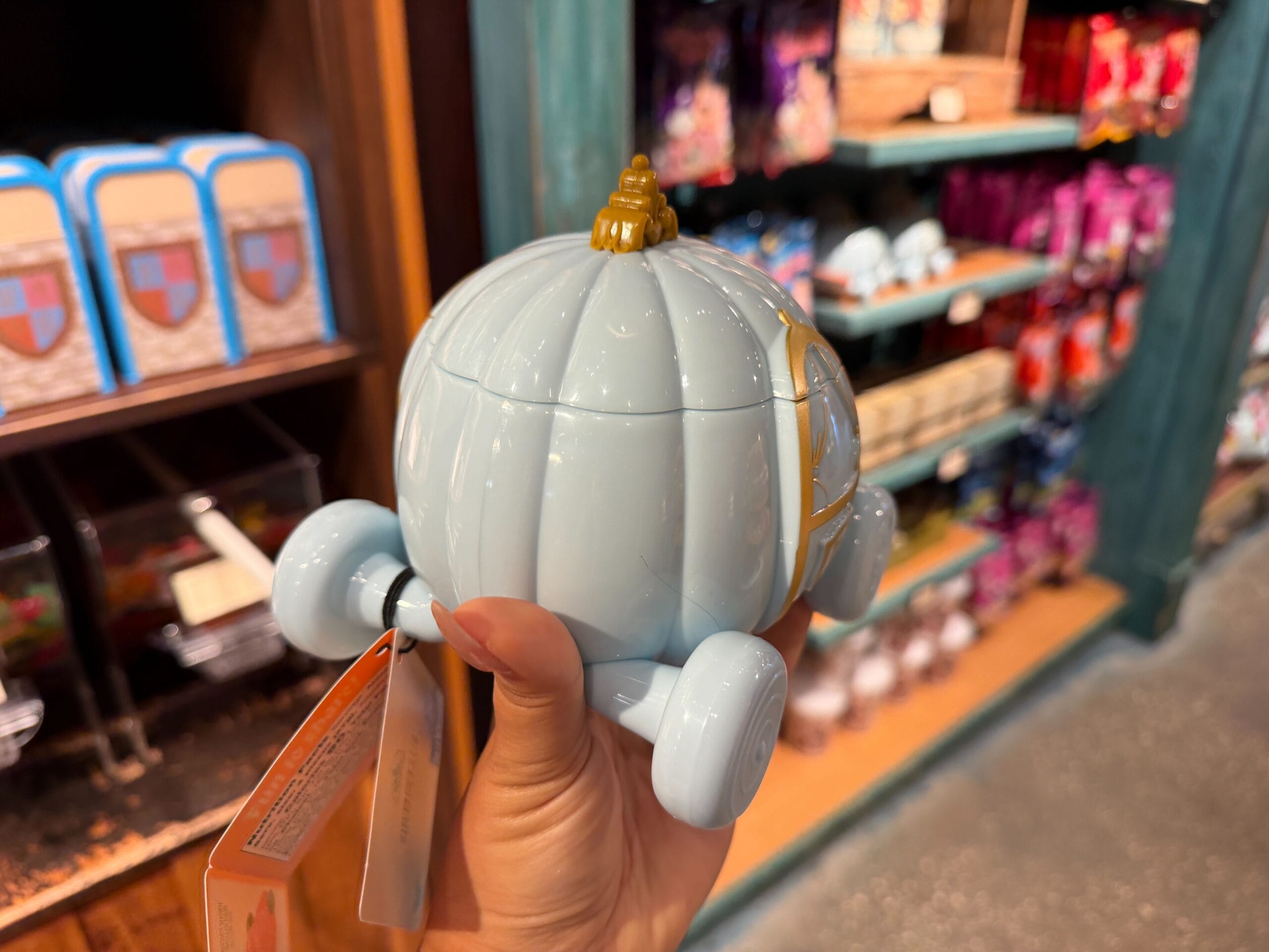 Side view of Cinderella's Enchanted Sour Jelly Pumpkins candy carriage case.