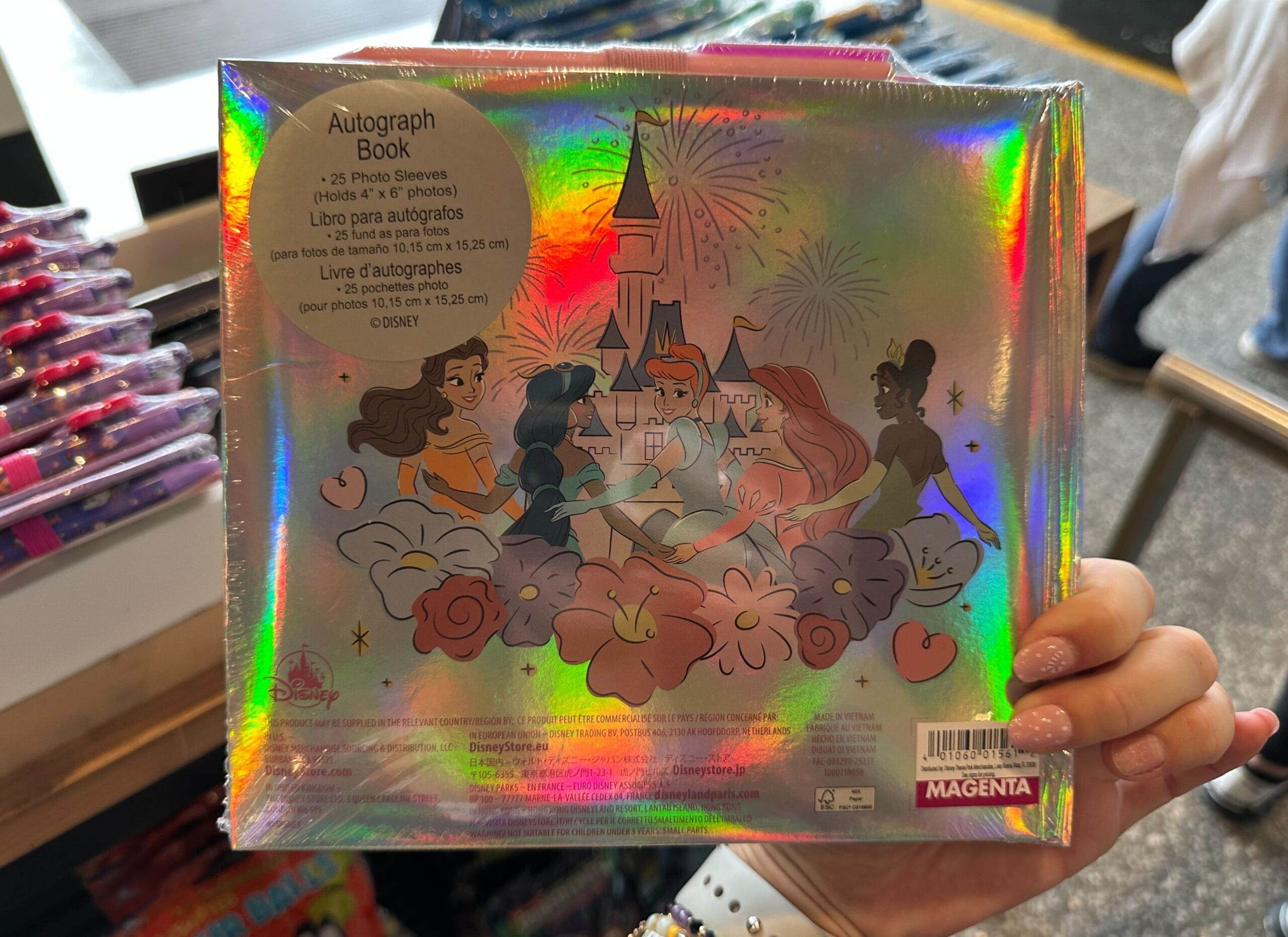 Disney Princess autograph book with photo sleeves back cover featuring Belle, Jasmine, Cinderella, Ariel, and Tiana.