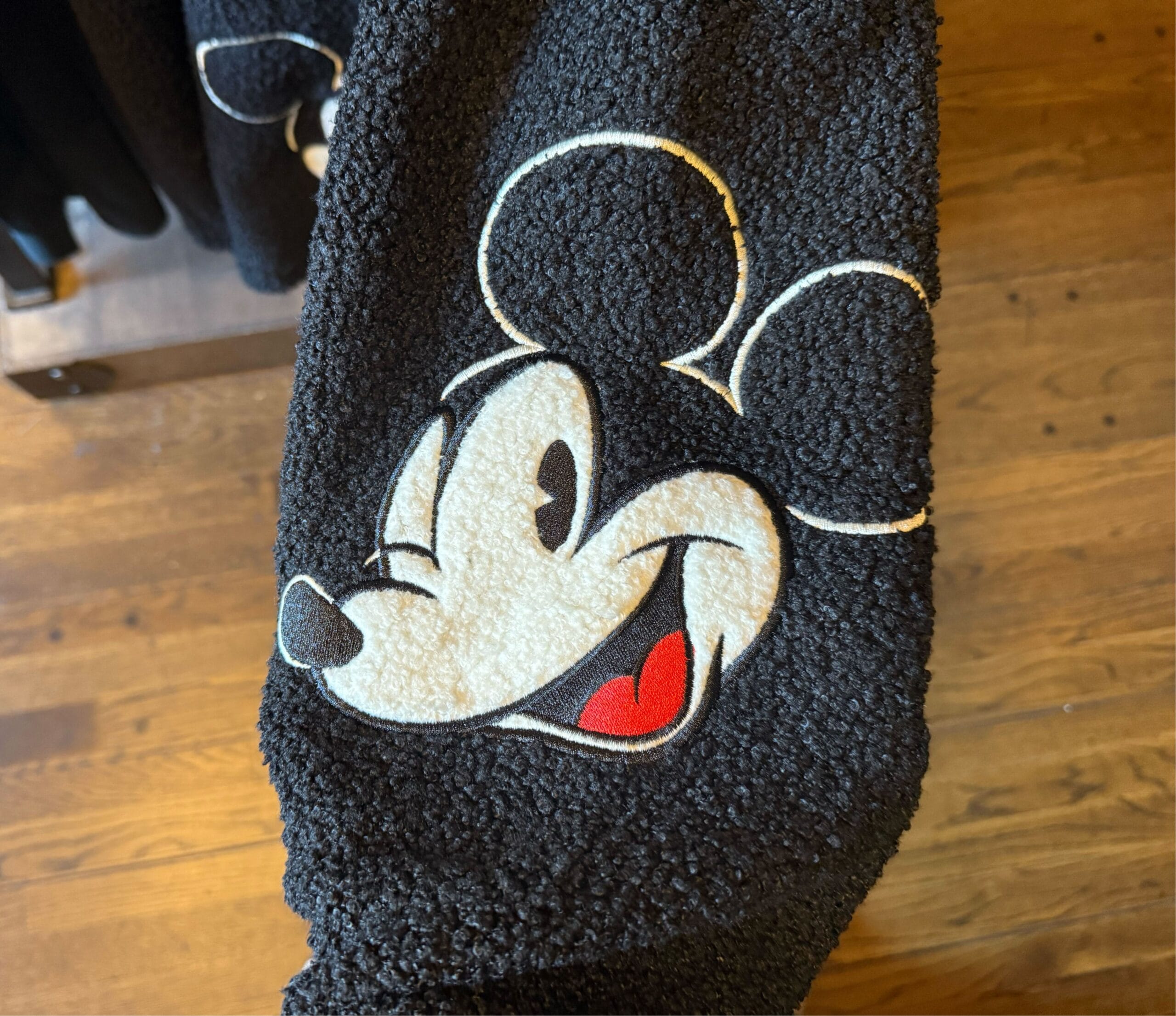 Arm of fluffy Mickey spirit jersey at Disneyland Resort.