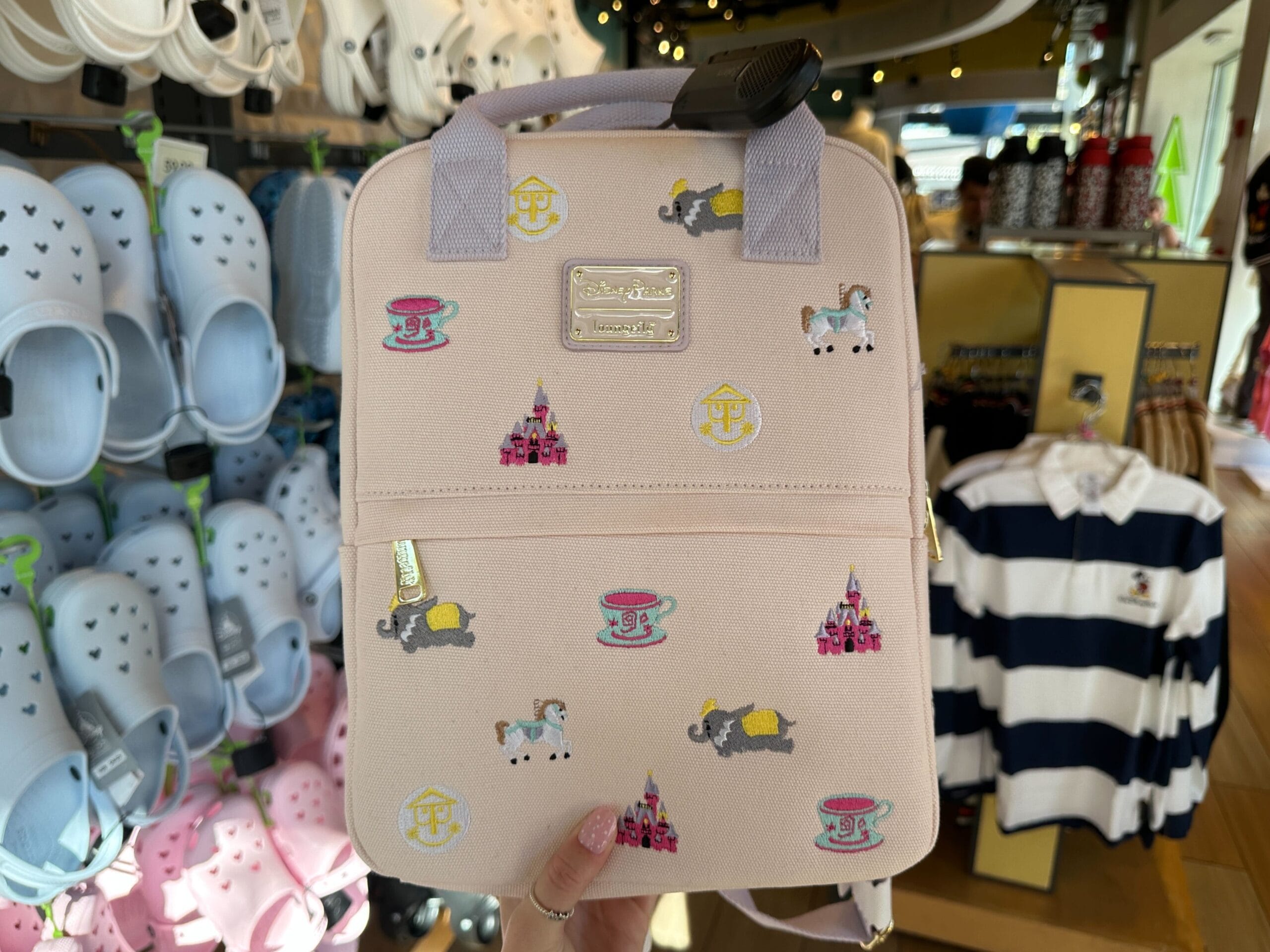 Loungefly Canvas Backpack Featuring Disney Park Attraction Icons
