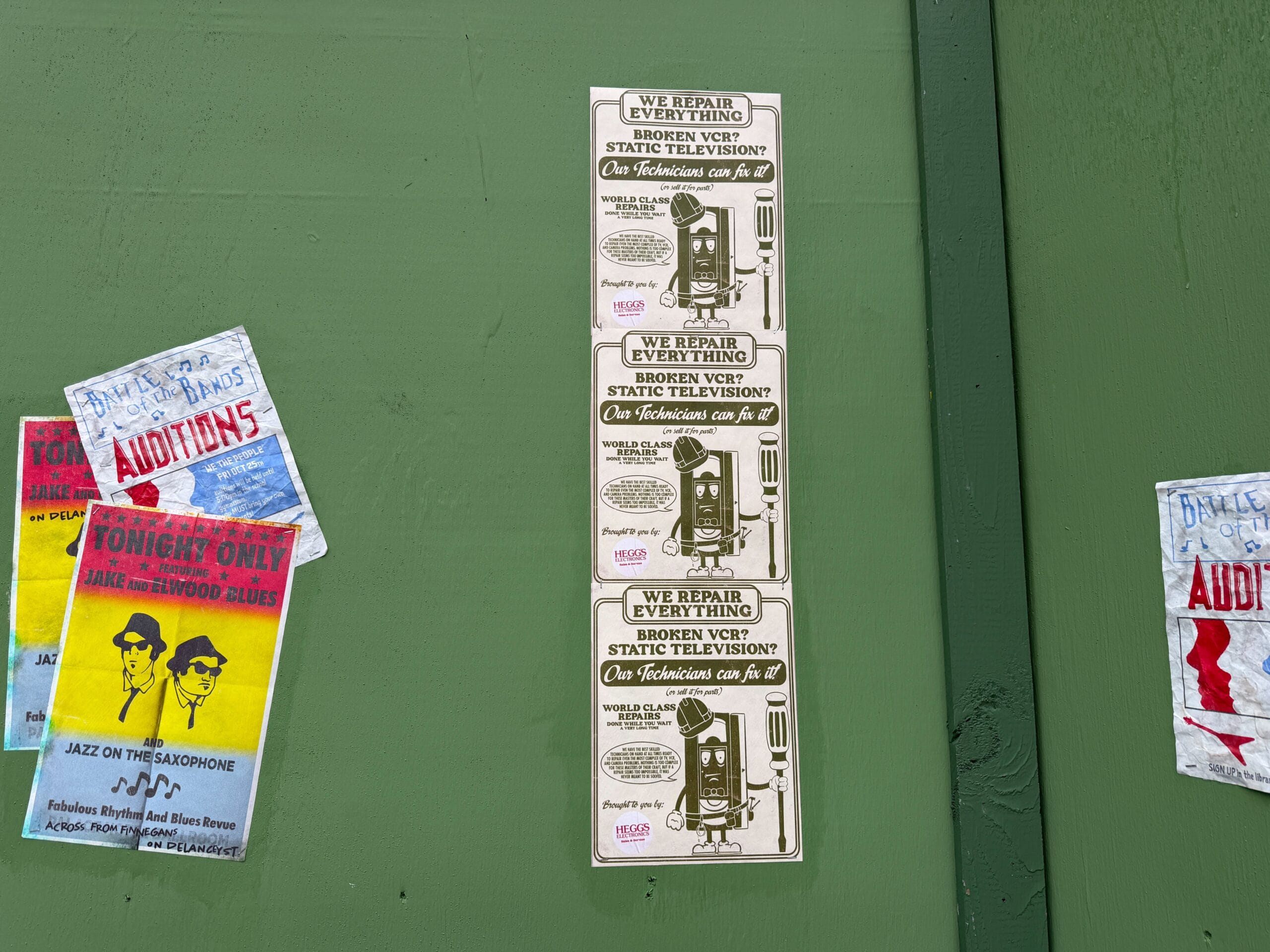 There are also additional Mr. Tape flyers on the walls.