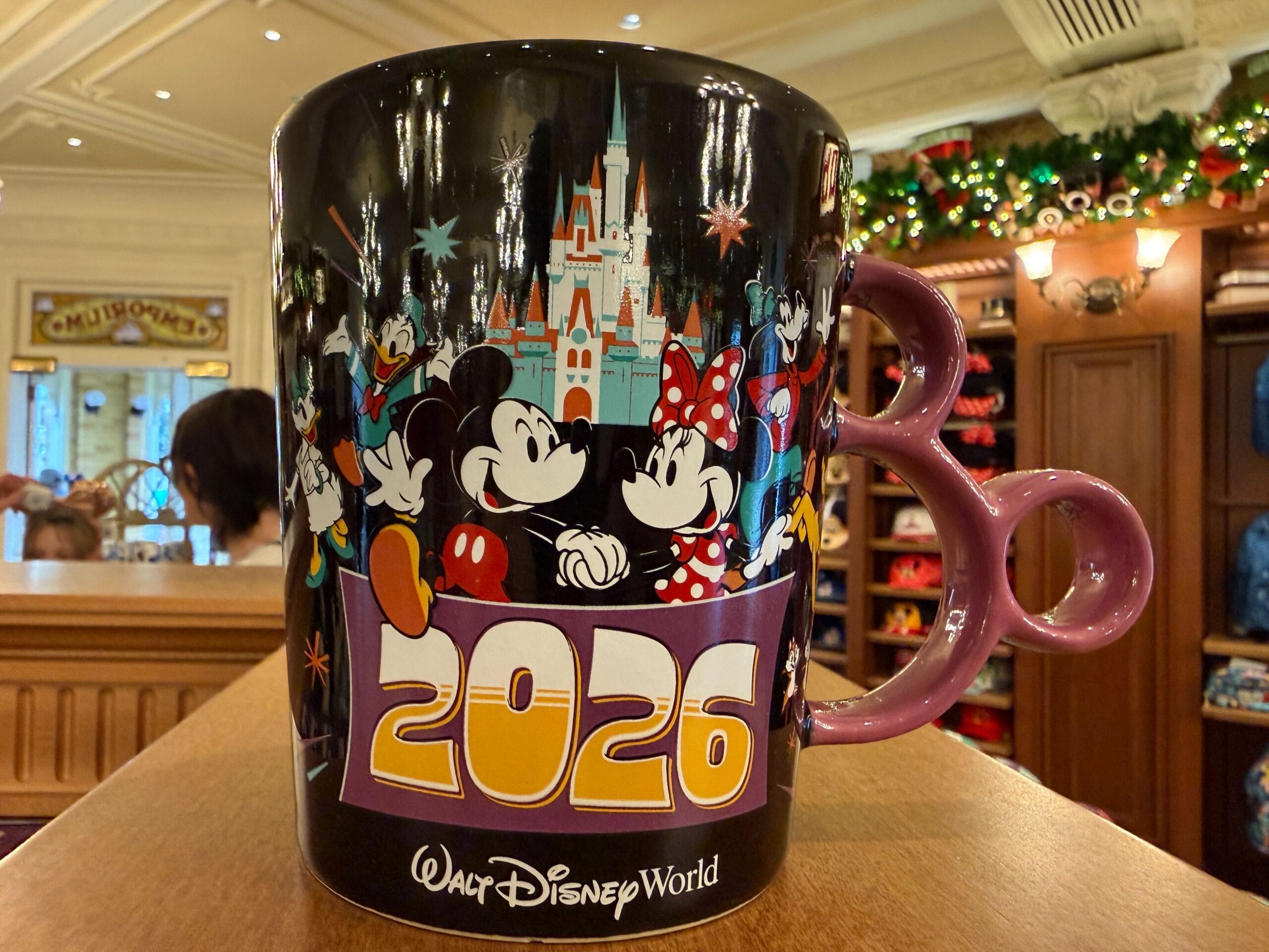 This mug holds 410 mL / 14 oz. It is dishwasher-safe and microwaveable.