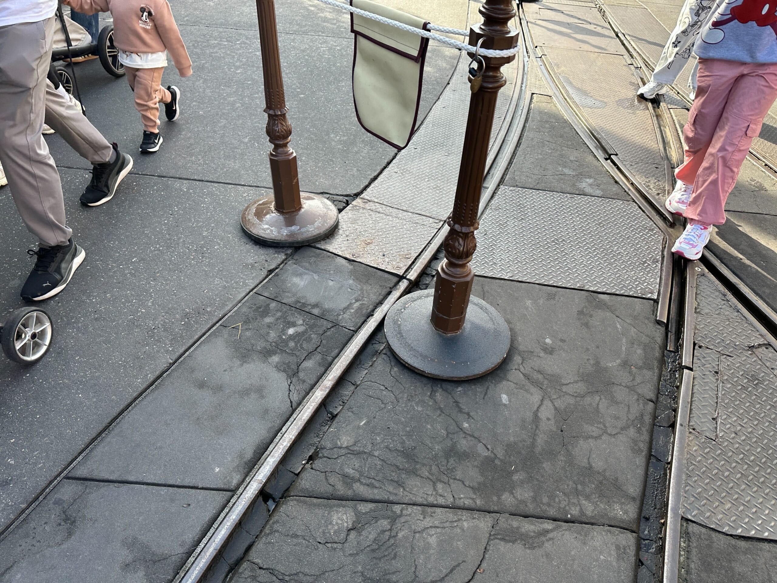Sections of damaged pavement on Main Street, U.S.A. at Magic Kingdom are affecting trolley operations and potentially guest photos.