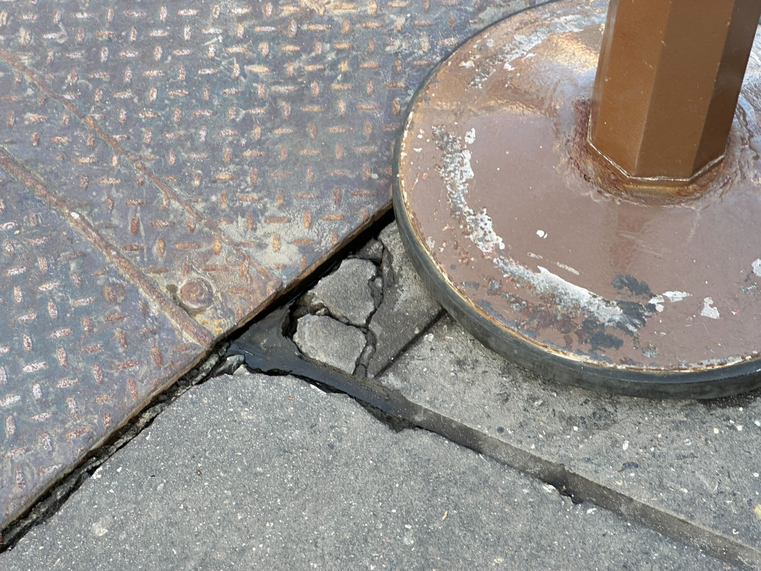 Sections of damaged pavement on Main Street, U.S.A. at Magic Kingdom are affecting trolley operations and potentially guest photos.