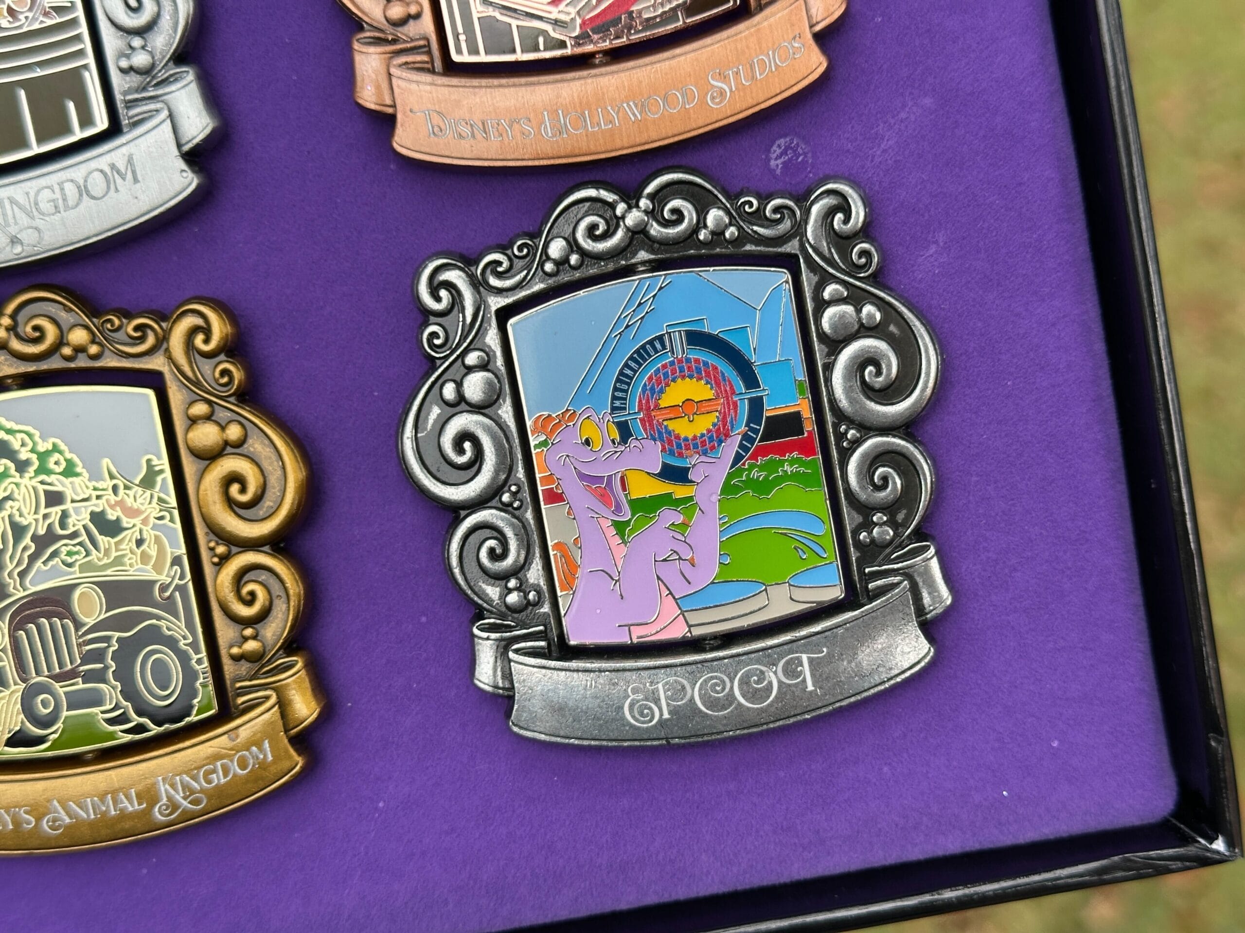 Figment is pictured on the reverse side in front of the Imagination pavilion.