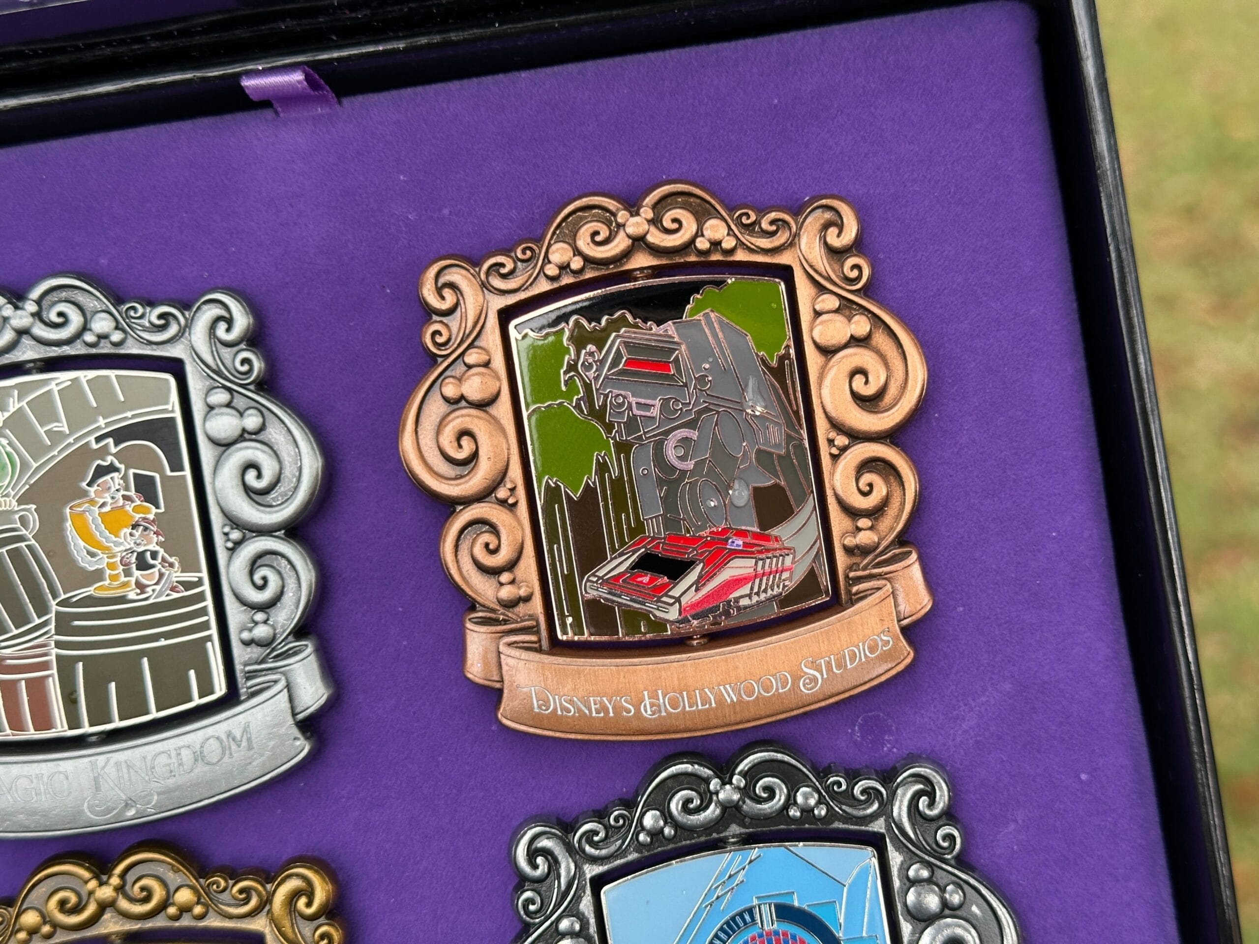 Star Tours is represented on the other side by a Starspeeder 1,000 flying past an AT-AT.